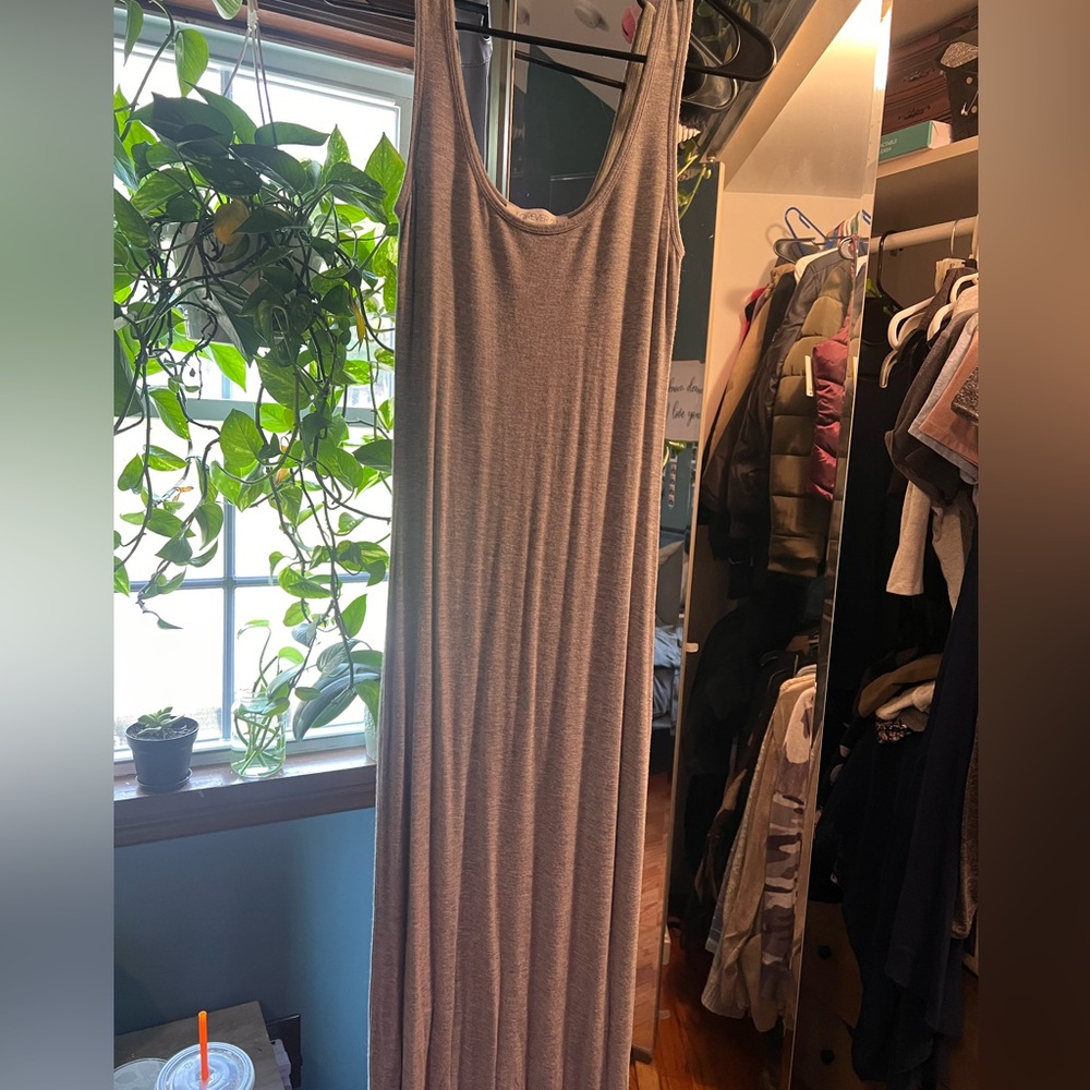 Long light grey dress. Never worn. No tags. Size small.